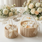English: Handwoven Rattan Flower Basket with Pearl Handle & Sheer Ribbon Bow, Wicker Floral Arrangement Basket for Wedding, Home Decor & Gift